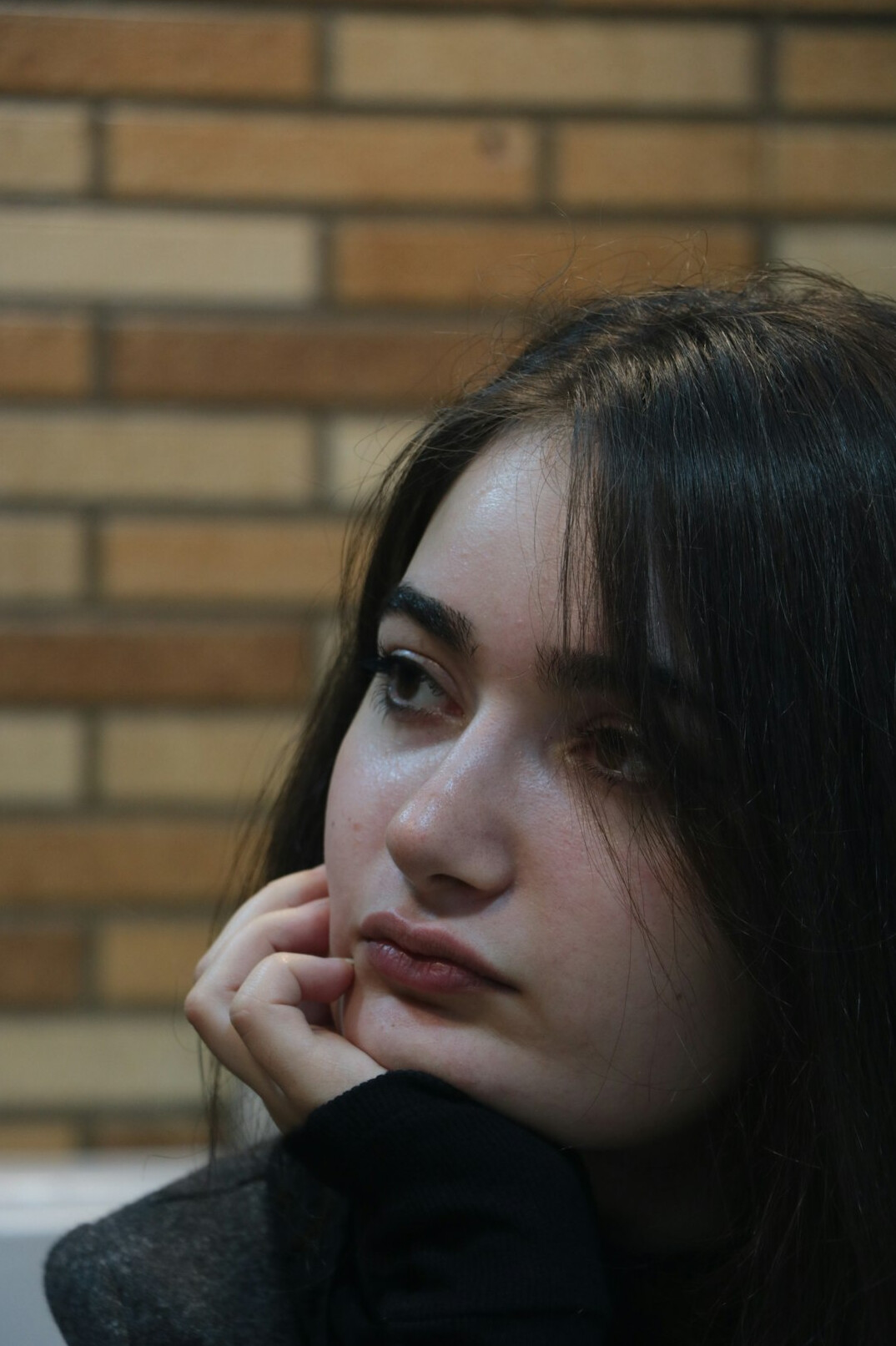Portrait of a young woman with dark hair