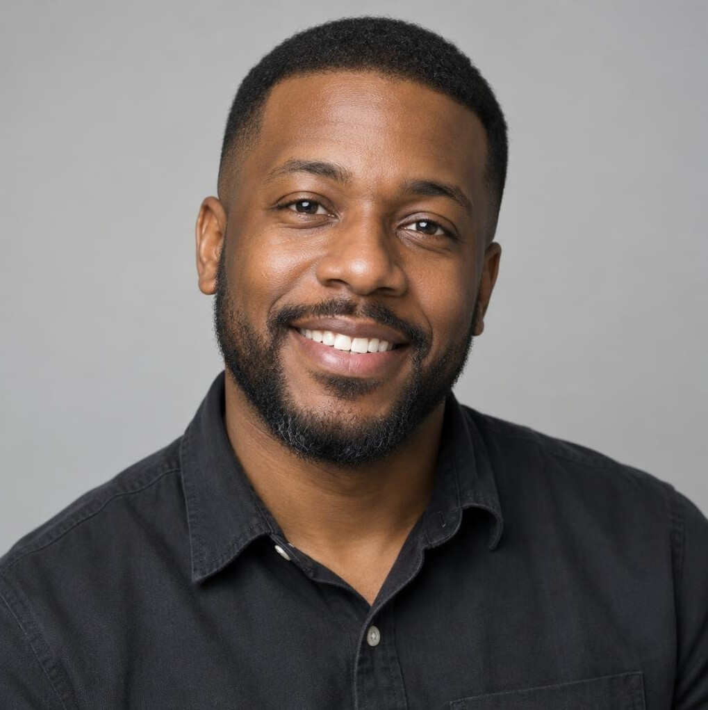 Portrait of a man with a beard smiling